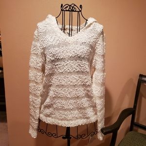 Woman's white hooded sweater